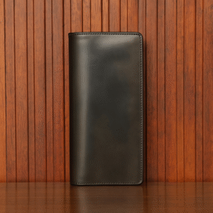 Elegant Long Coat Wallet in genuine cow leather with a sleek, patent finish. Spacious design for cash and cards, perfect for formal and casual use