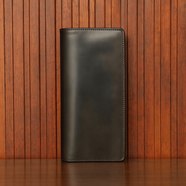 Elegant Long Coat Wallet in genuine cow leather with a sleek, patent finish. Spacious design for cash and cards, perfect for formal and casual use